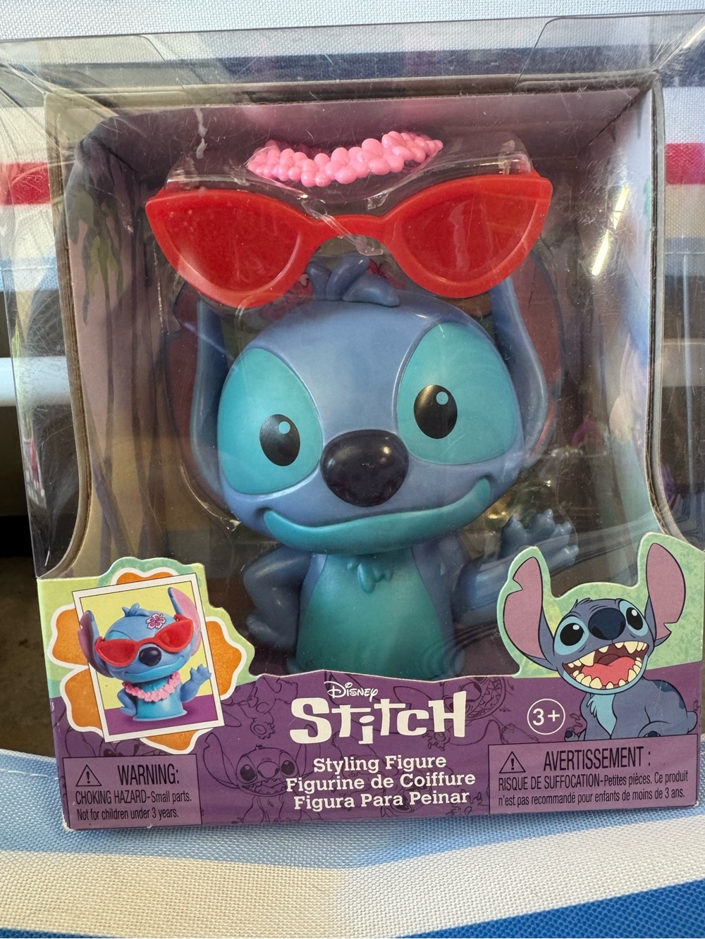 Disney Stitch Figure with Red Sunglasses and Pink Lei